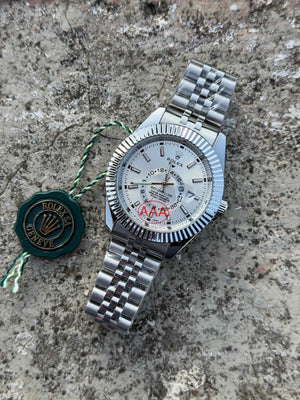 Rolex Sky-Dweller features a prominent fluted bezel and a silver dial.