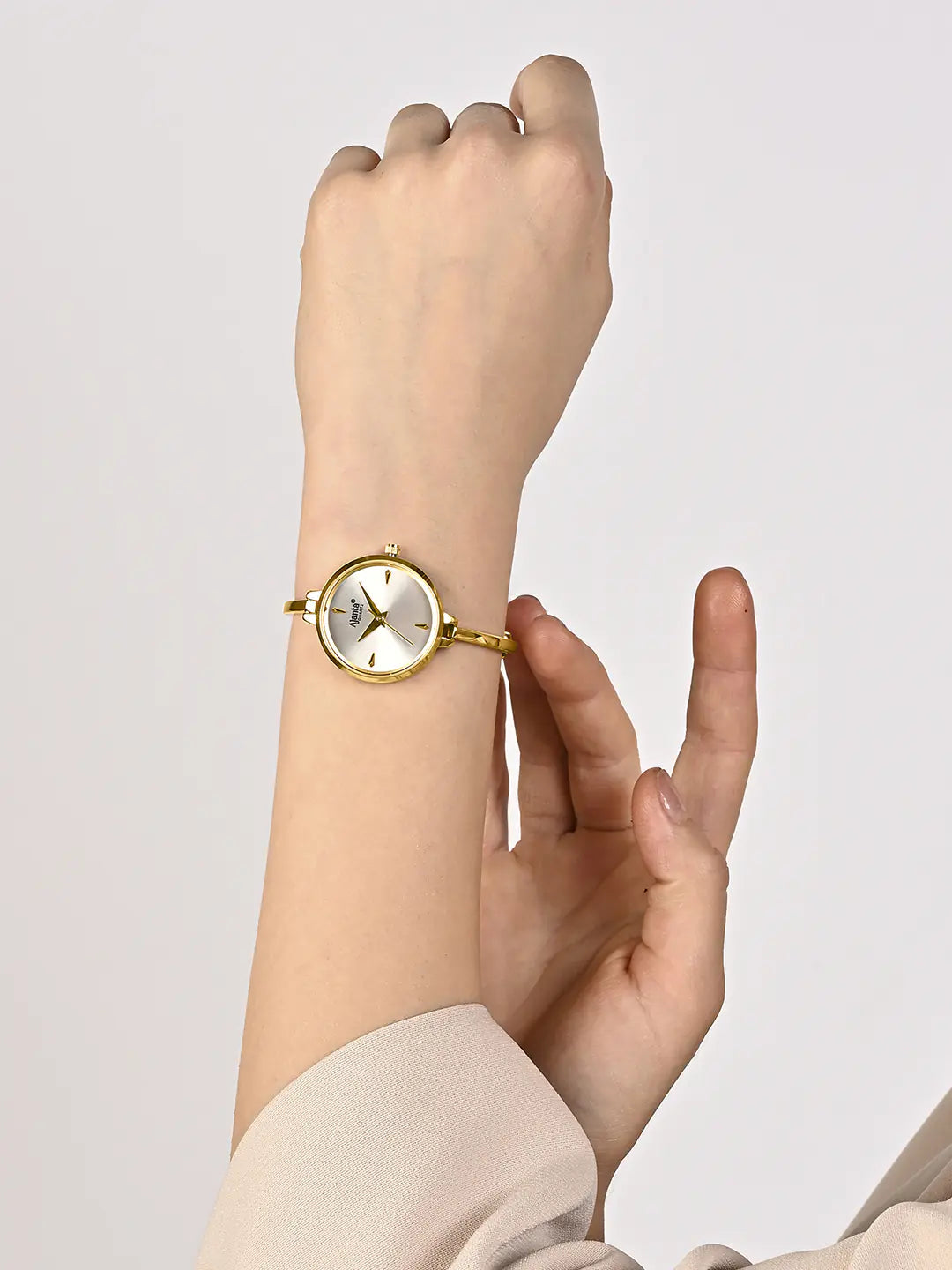 Ajanta Quartz Women’s Elegant Golden Bangle Watch with Silver Dial (AWC052PMSL/3) - 1 Year Warranty