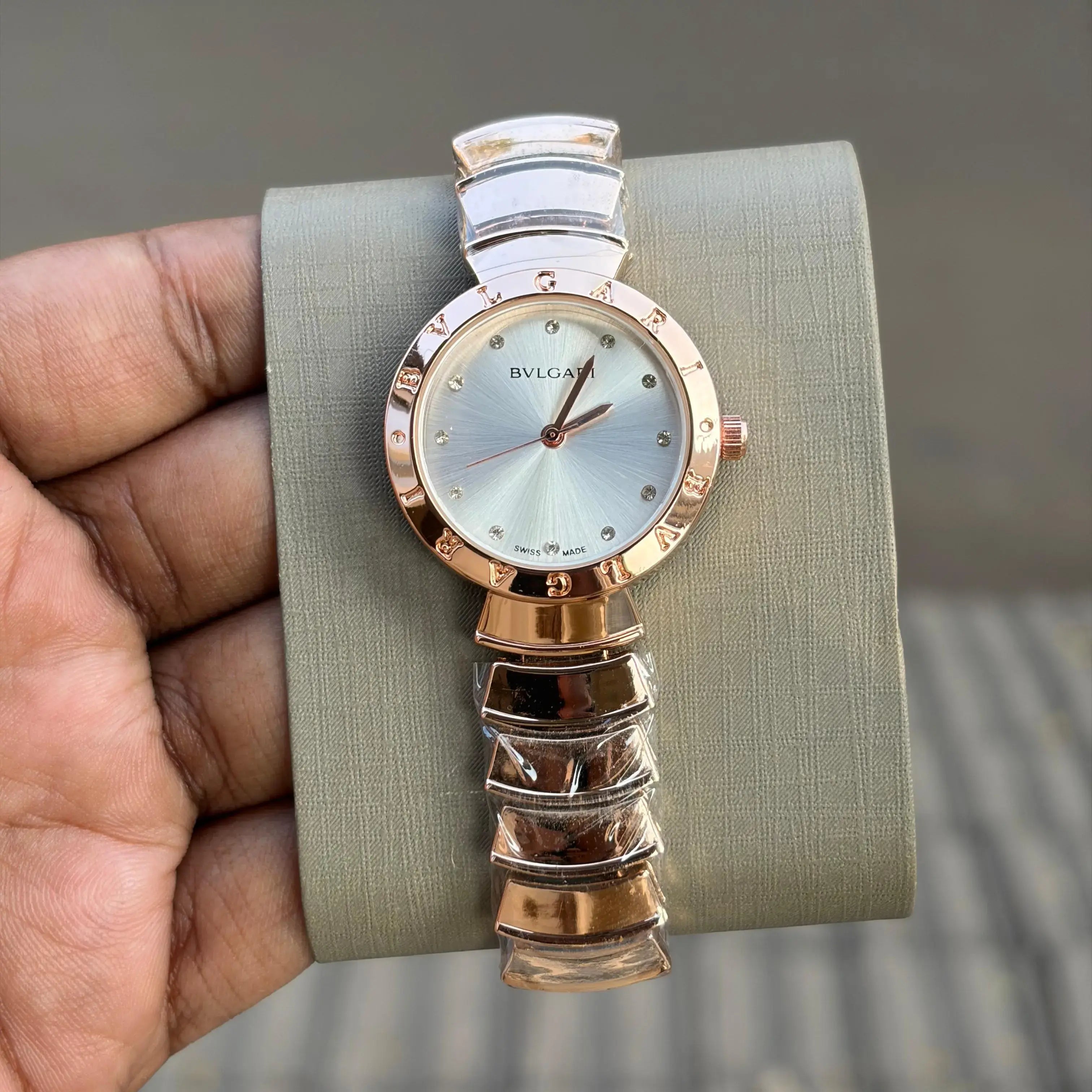 BVLG#RI-6715 - OM SAI TIMEPIECE